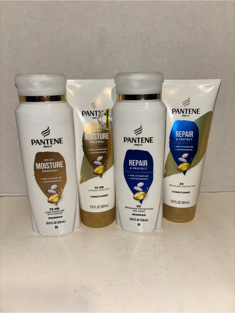 Assorted Pantene Shampoo and Conditioner Bundle of 4-white blue gold